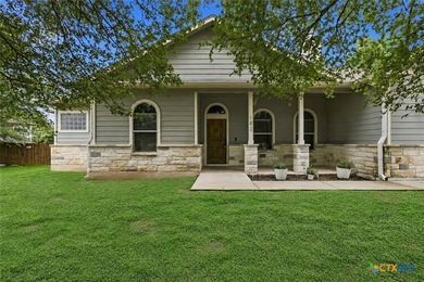 Set on a large 0.476-acre lot backing to a serene greenbelt - photo 1