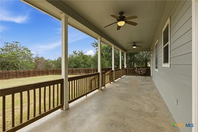Set on a large 0.476-acre lot backing to a serene greenbelt - photo 5