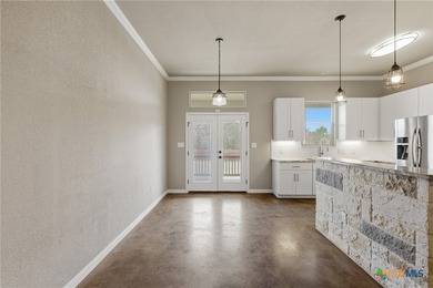 Set on a large 0.476-acre lot backing to a serene greenbelt - photo 10