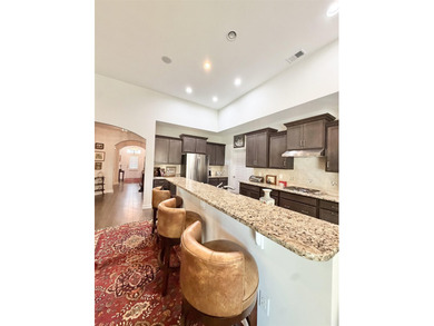 Welcome to this spacious and beautifully maintained 3-bedroom - photo 8