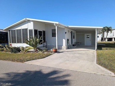 Welcome to this charming and newly refreshed home located in the - photo 1