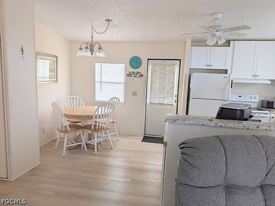 Welcome to this charming and newly refreshed home located in the - photo 2