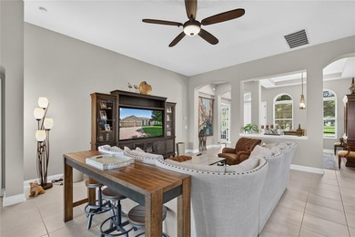 Virtually Staged. Enjoy golf and water views from this - photo 8