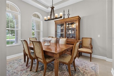 Virtually Staged. Enjoy golf and water views from this - photo 9