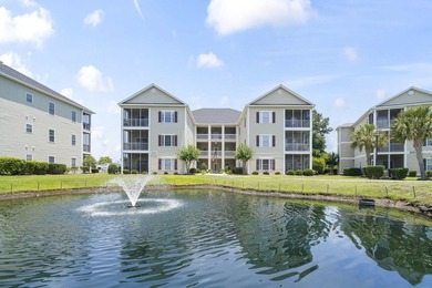 Situated in the heart of Surfside Beach, this second-floor condo - photo 1