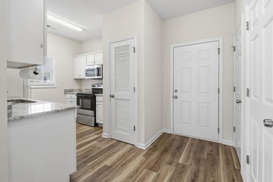 Situated in the heart of Surfside Beach, this second-floor condo - photo 7