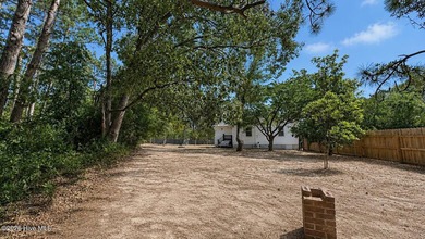 Welcome to this cute and cozy home situated on a rare 1.01-acre - photo 23
