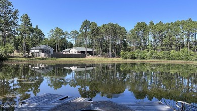 Welcome to this cute and cozy home situated on a rare 1.01-acre - photo 26