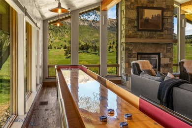 Set against the dramatic backdrop of the Bridger Mountains - photo 38
