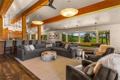 Set against the dramatic backdrop of the Bridger Mountains - photo 47