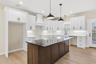 Indulge in 4789 square feet of refined lakefront living, where - photo 9
