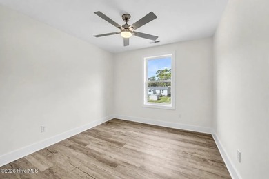 PRICE IMPROVEMENT! Last Home Available! One of three new homes - photo 25