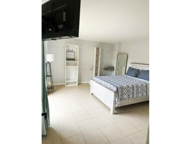 Welcome to The Pines! Step into this light-filled and - photo 6