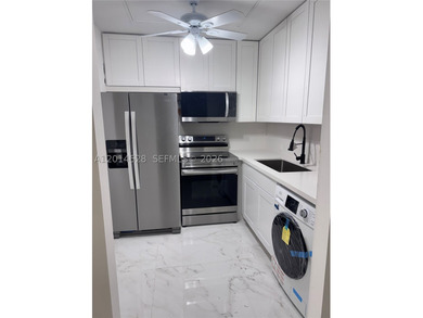 Beautifully remodeled 1-bedroom, 1.5-bath condo located in the - photo 3