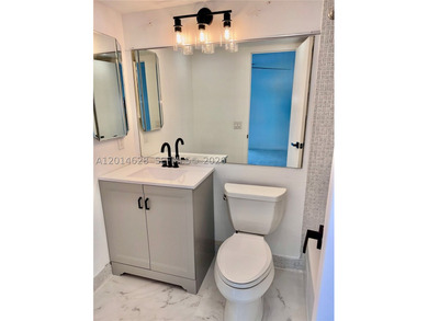 Beautifully remodeled 1-bedroom, 1.5-bath condo located in the - photo 9