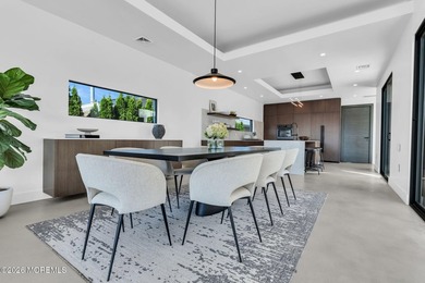 A rare modern waterfront retreat, this architect-designed home - photo 13