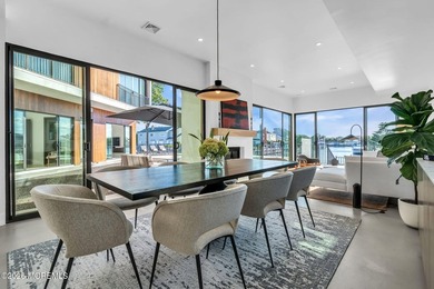 A rare modern waterfront retreat, this architect-designed home - photo 14