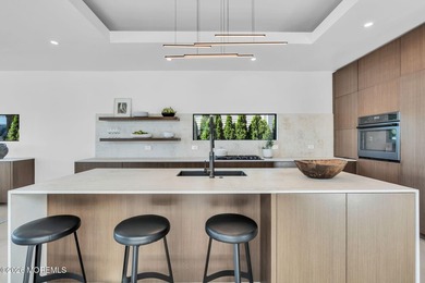 A rare modern waterfront retreat, this architect-designed home - photo 18