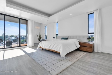 A rare modern waterfront retreat, this architect-designed home - photo 22