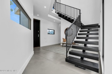 A rare modern waterfront retreat, this architect-designed home - photo 34