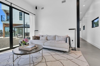 A rare modern waterfront retreat, this architect-designed home - photo 37
