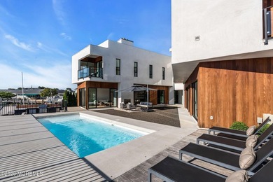 A rare modern waterfront retreat, this architect-designed home - photo 45