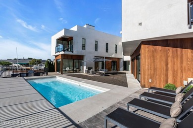 A rare modern waterfront retreat, this architect-designed home - photo 46