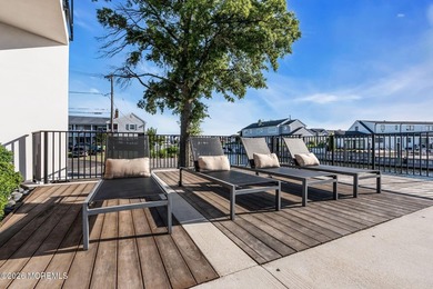 A rare modern waterfront retreat, this architect-designed home - photo 47