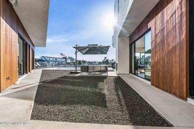 A rare modern waterfront retreat, this architect-designed home - photo 48