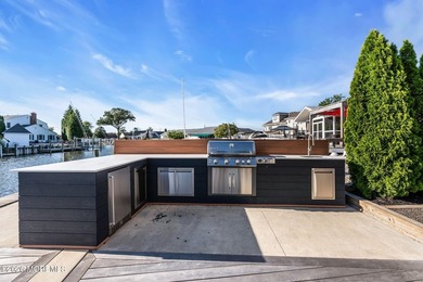 A rare modern waterfront retreat, this architect-designed home - photo 49