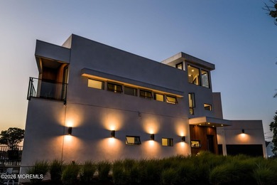 A rare modern waterfront retreat, this architect-designed home - photo 50