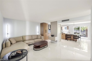 Exquisitely remodeled second-floor condominium in the highly - photo 6