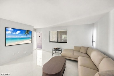 Exquisitely remodeled second-floor condominium in the highly - photo 7