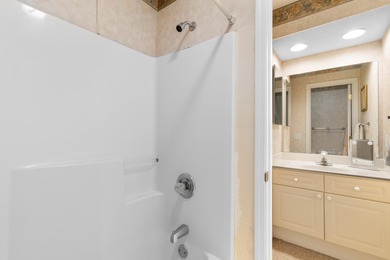 Tucked away in the highly sought-after Spinnaker Cove community