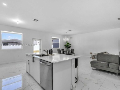Welcome to this stunning 2024 built home in the sought-after - photo 6