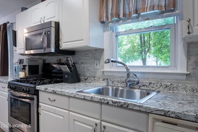 Welcome home to this well-cared for ranch in Lake Riviera - photo 7