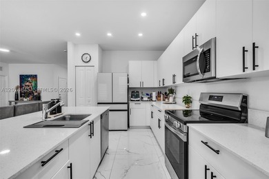 Welcome to this stunning 2024 built home in the sought-after - photo 8