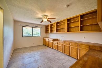Discover the charm and comfort of island living in this - photo 12