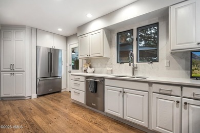 Experience refined mountain living in this exquisitely designed - photo 9