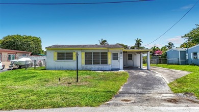 Discover the potential of this waterfront 3-bedroom, 2-bath home - photo 1