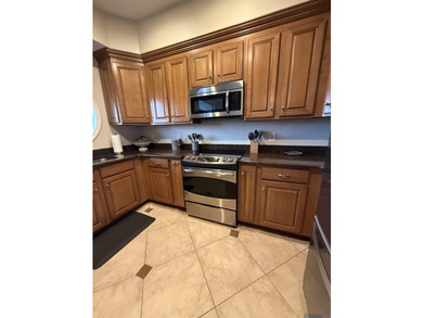 Beautiful waterfront living. This 2-bedroom, 1 full bath + half - photo 6