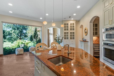 Welcome to 4406 Cascades Blvd--an exceptional residence nestled