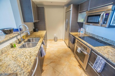 Enjoy beautiful city views from this residence in a full-service - photo 3