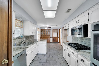 This 3 bedroom, 2 full bath home has so much to offer in an - photo 11