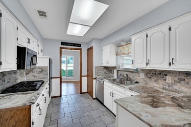 This 3 bedroom, 2 full bath home has so much to offer in an - photo 12