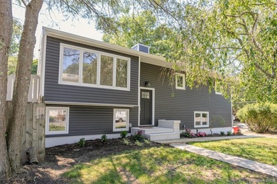 PRICE IMPROVED! Welcome to this exceptional 4-bedroom, 3-bath - photo 1