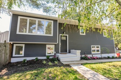 PRICE IMPROVED! Welcome to this exceptional 4-bedroom, 3-bath - photo 2