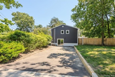 PRICE IMPROVED! Welcome to this exceptional 4-bedroom, 3-bath - photo 3