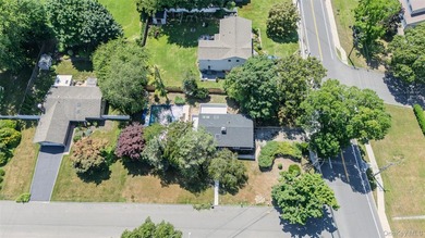 PRICE IMPROVED! Welcome to this exceptional 4-bedroom, 3-bath - photo 4