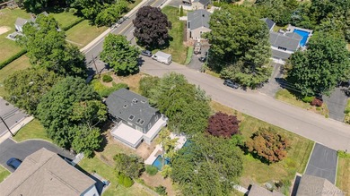 PRICE IMPROVED! Welcome to this exceptional 4-bedroom, 3-bath - photo 6